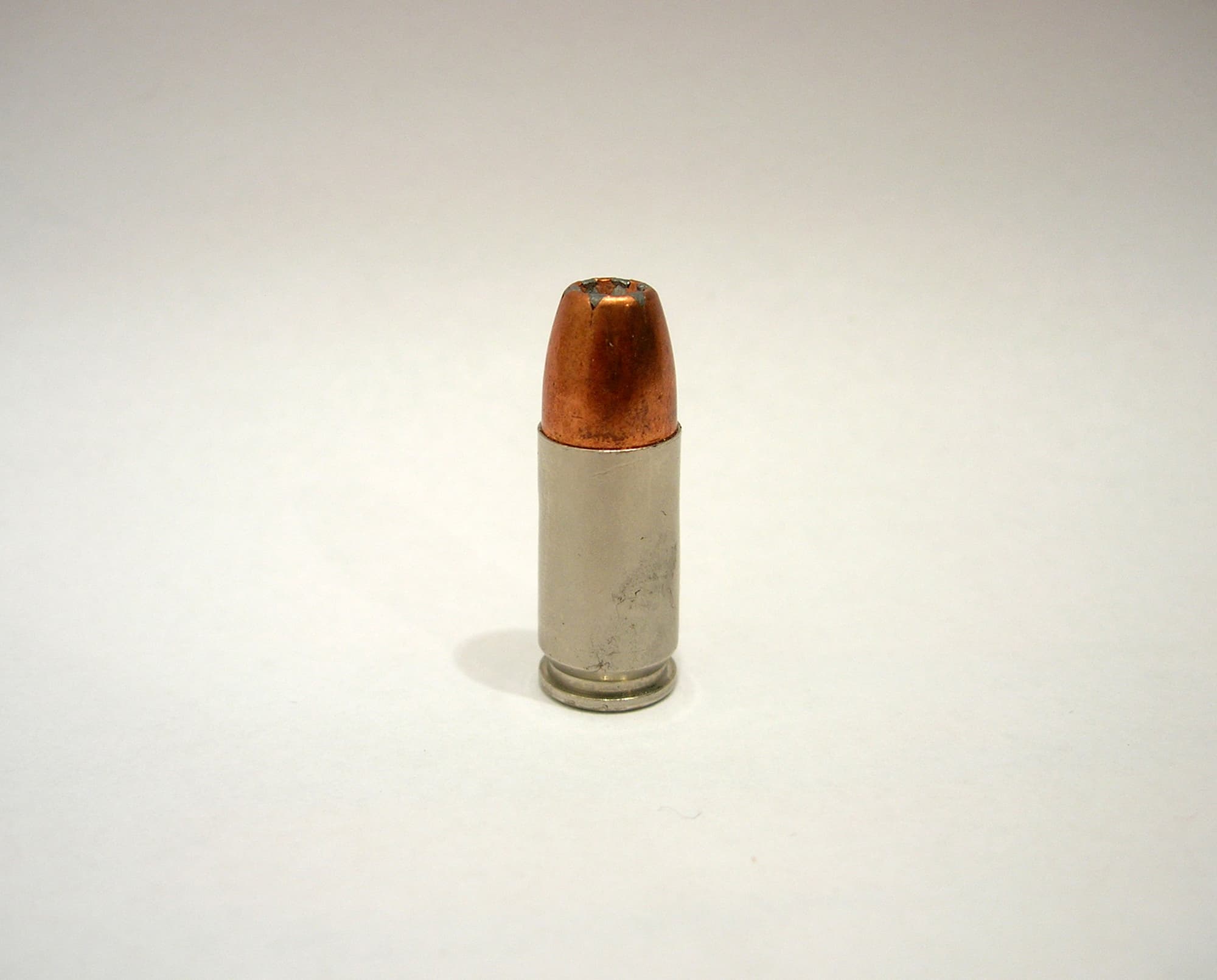 Our Contract (detail), bullet, bulletproof glass, vitrine. 2007