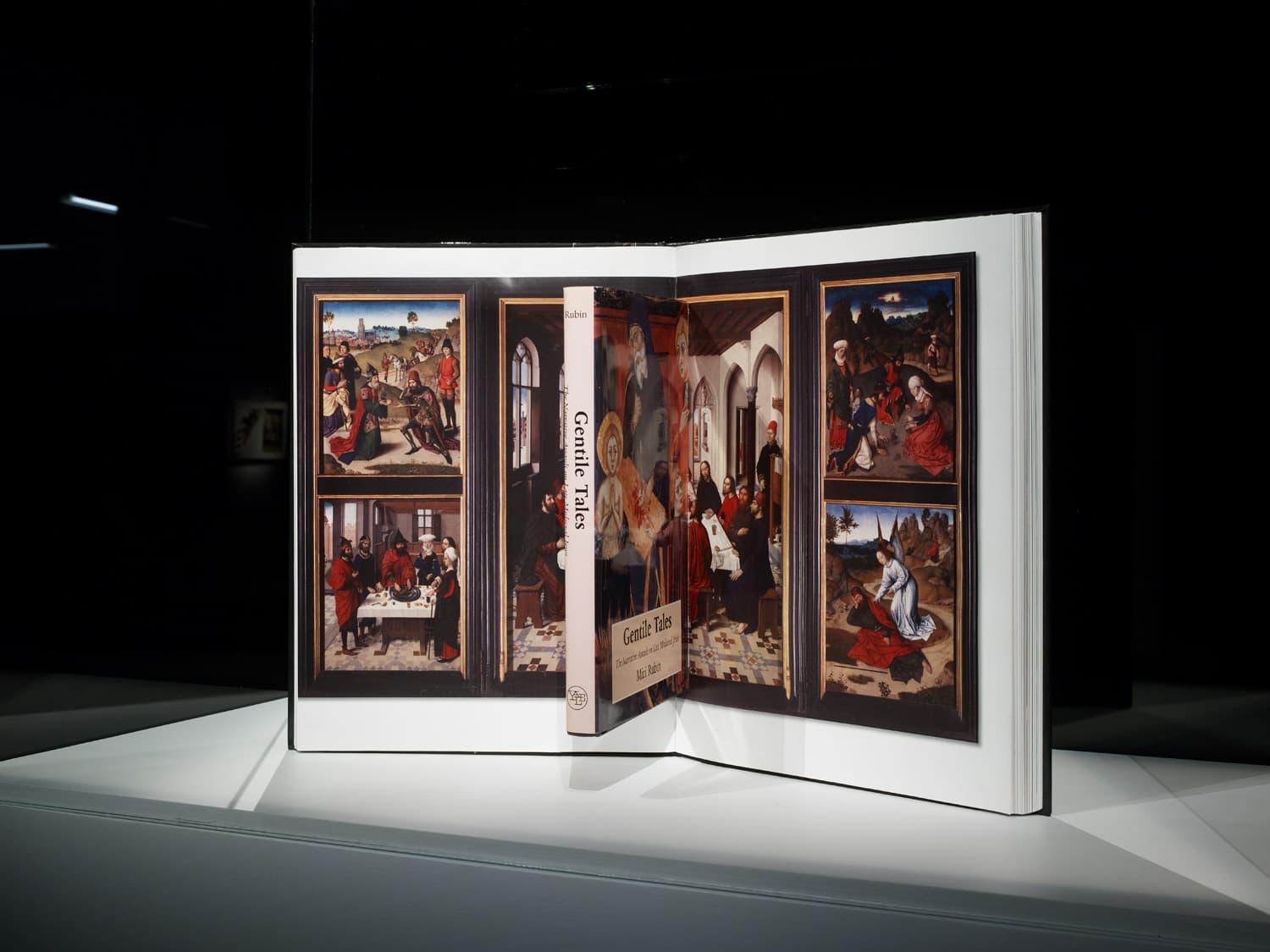 Jill Magid, Host Desecration, 2022, altered books, 12-7/8” h x 19-7/8” w x 7” d. On view in 'Jill Magid. The Migration of the Wings,' 2023, M Leuven, photo (c) Eline Willaert for M Leuven.