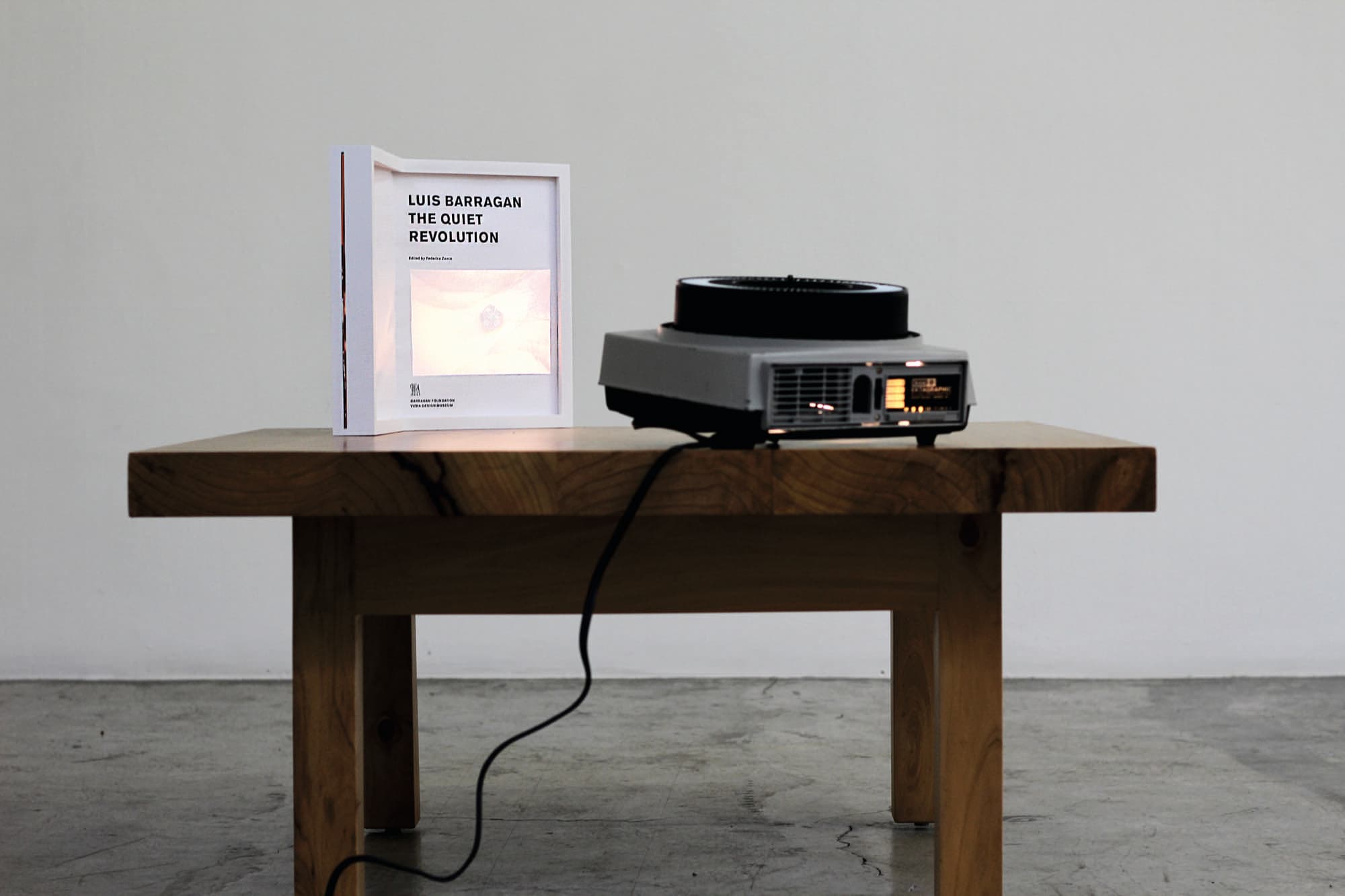 The Body (of Work), 2016, Low sabino table after Luis Barragán, slide carousel with 80 slides, framed book, 31.5 x 41 x 4.7cm (12.5 x 17.5 x 2inches)